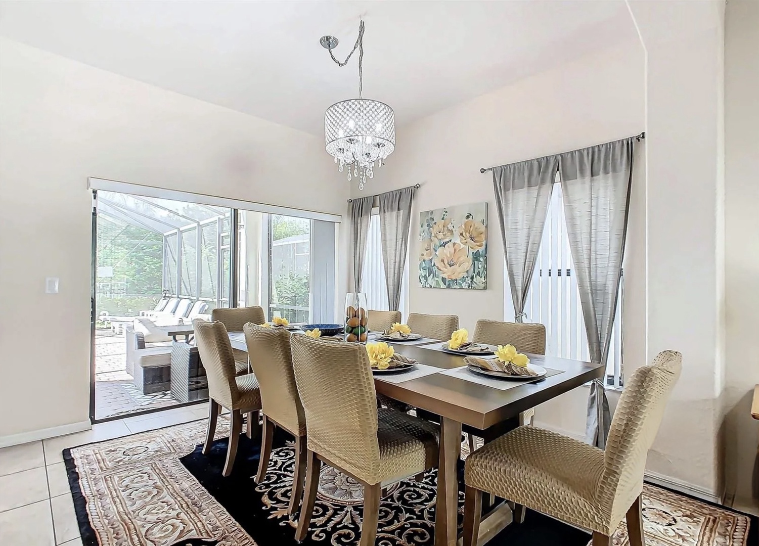 Dining area with table and seating for 8