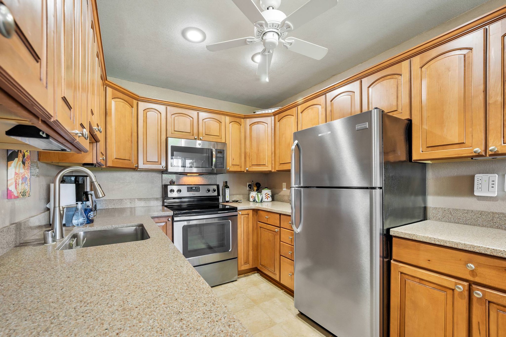 Kitchen with drip coffee maker, blender, toaster, dishwasher, and more
