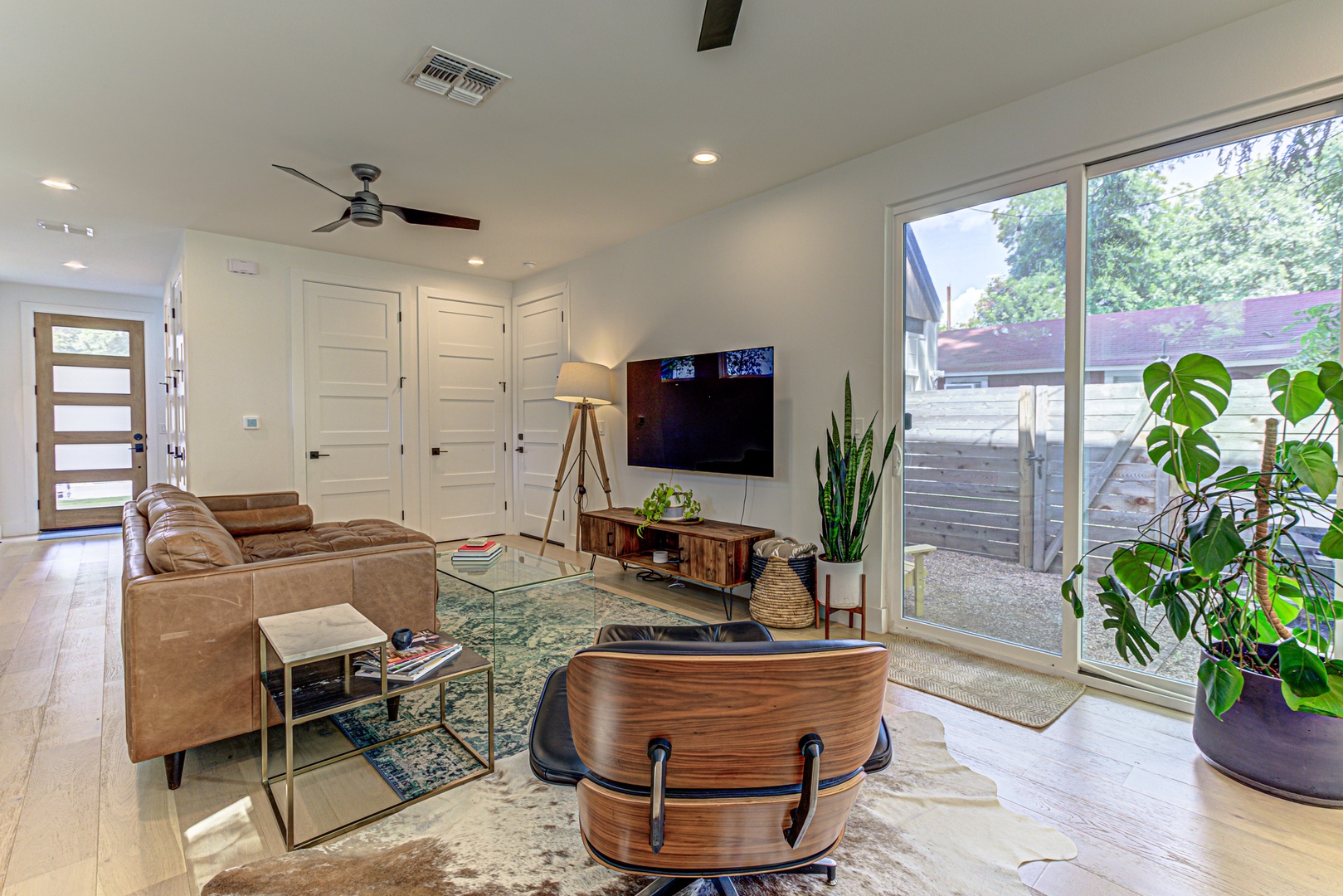 Open living space with Smart TV, and leather seating