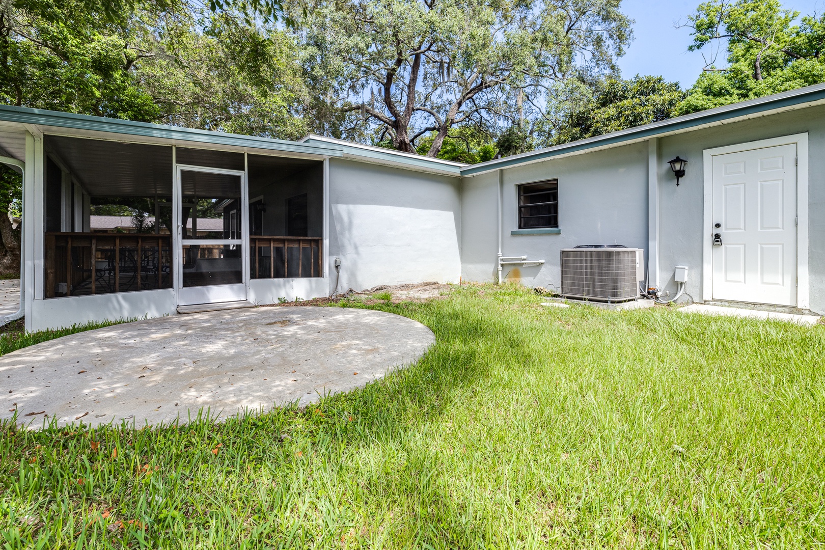 Lounge the day away in the fresh air on the screened porch!