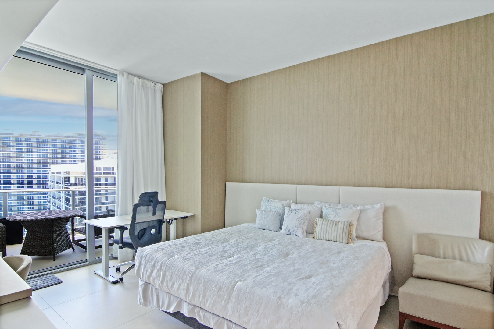 The 2nd of 2 king suites offers a private en suite, Smart TV, & balcony access