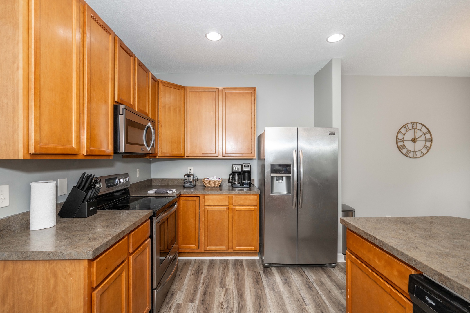 The open, airy kitchen offers ample space & every home comfort