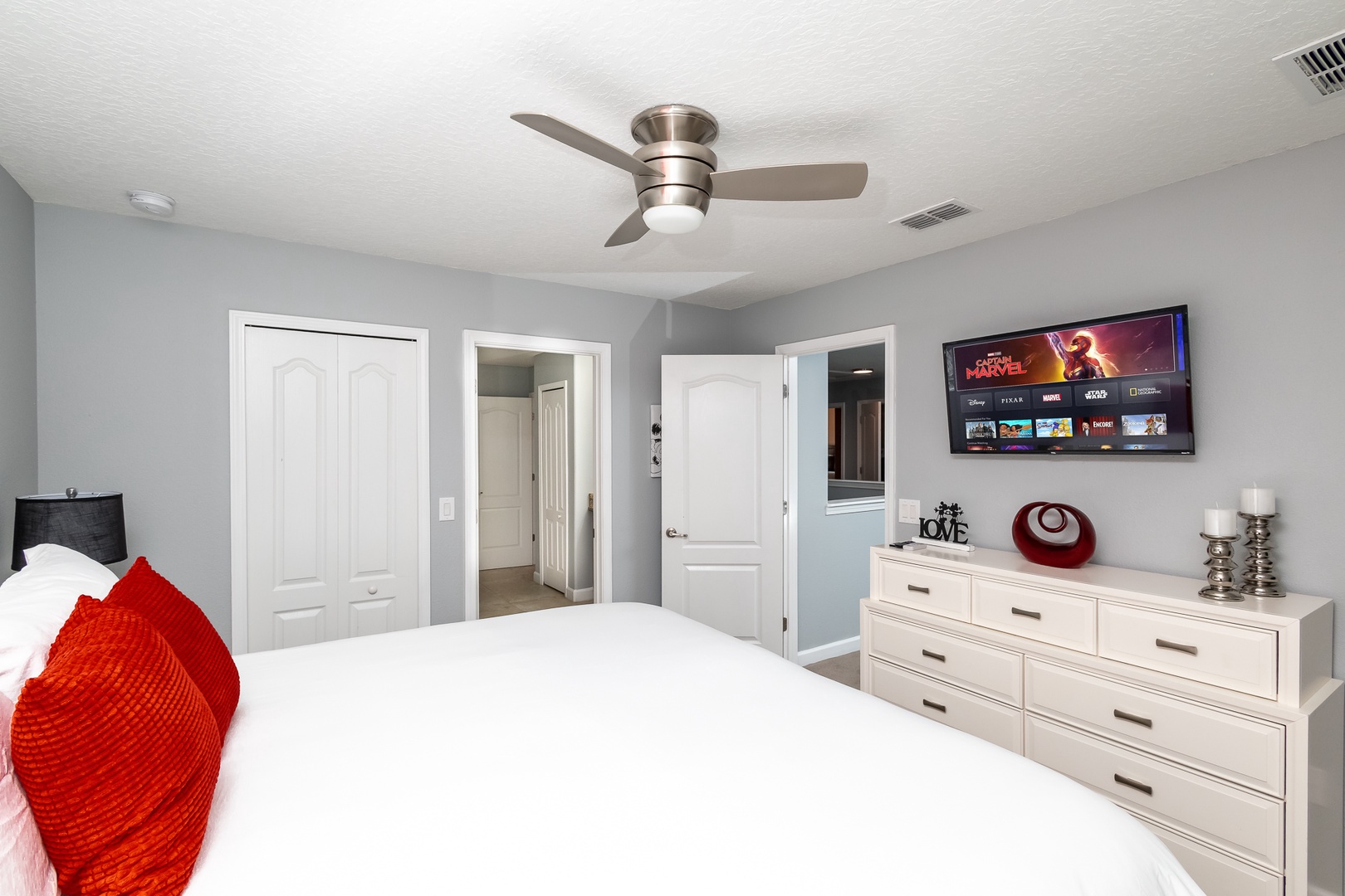 Bedroom 3 Mickey Mouse themed with king bed, Smart TV, and shared ensuite