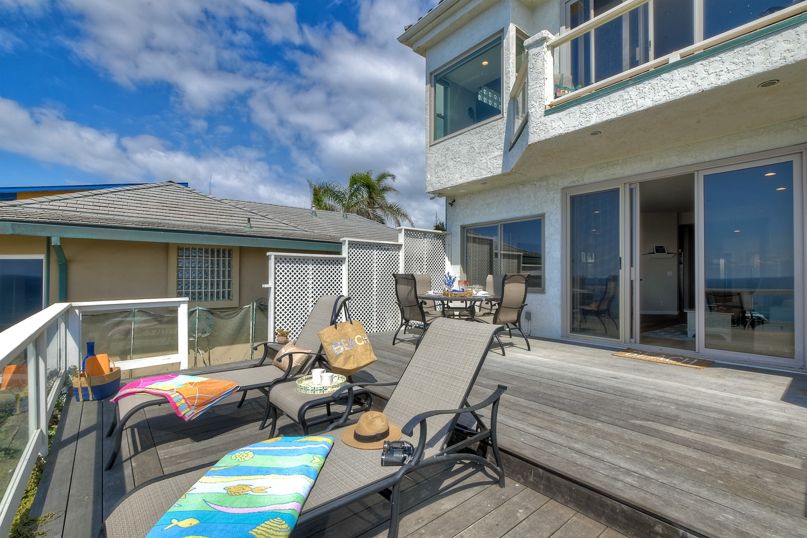 Lounge the day away or dine alfresco with ocean views on the deck