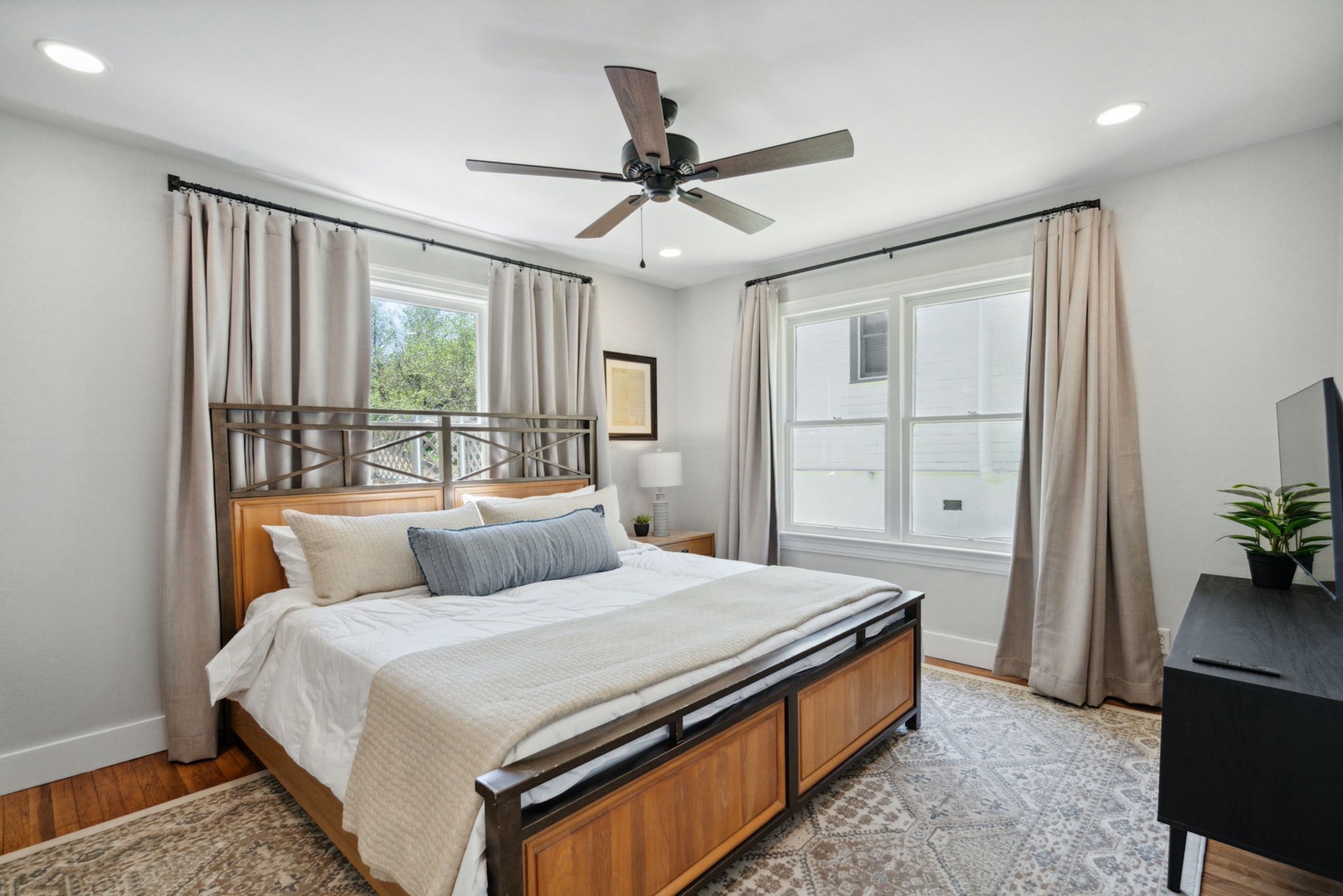 This tranquil bedroom sanctuary includes a king bed & Smart TV