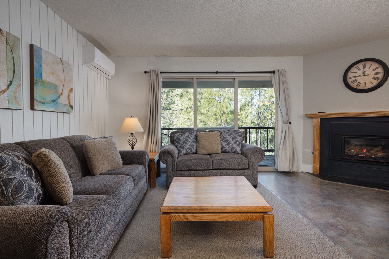 Living area with comfy seating and Smart TV