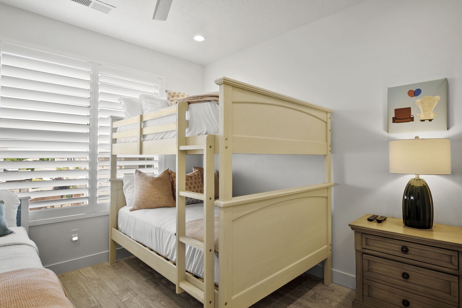 Bedroom # 4 offers a full-over-full bunkbed, twin bed, and Smart TV