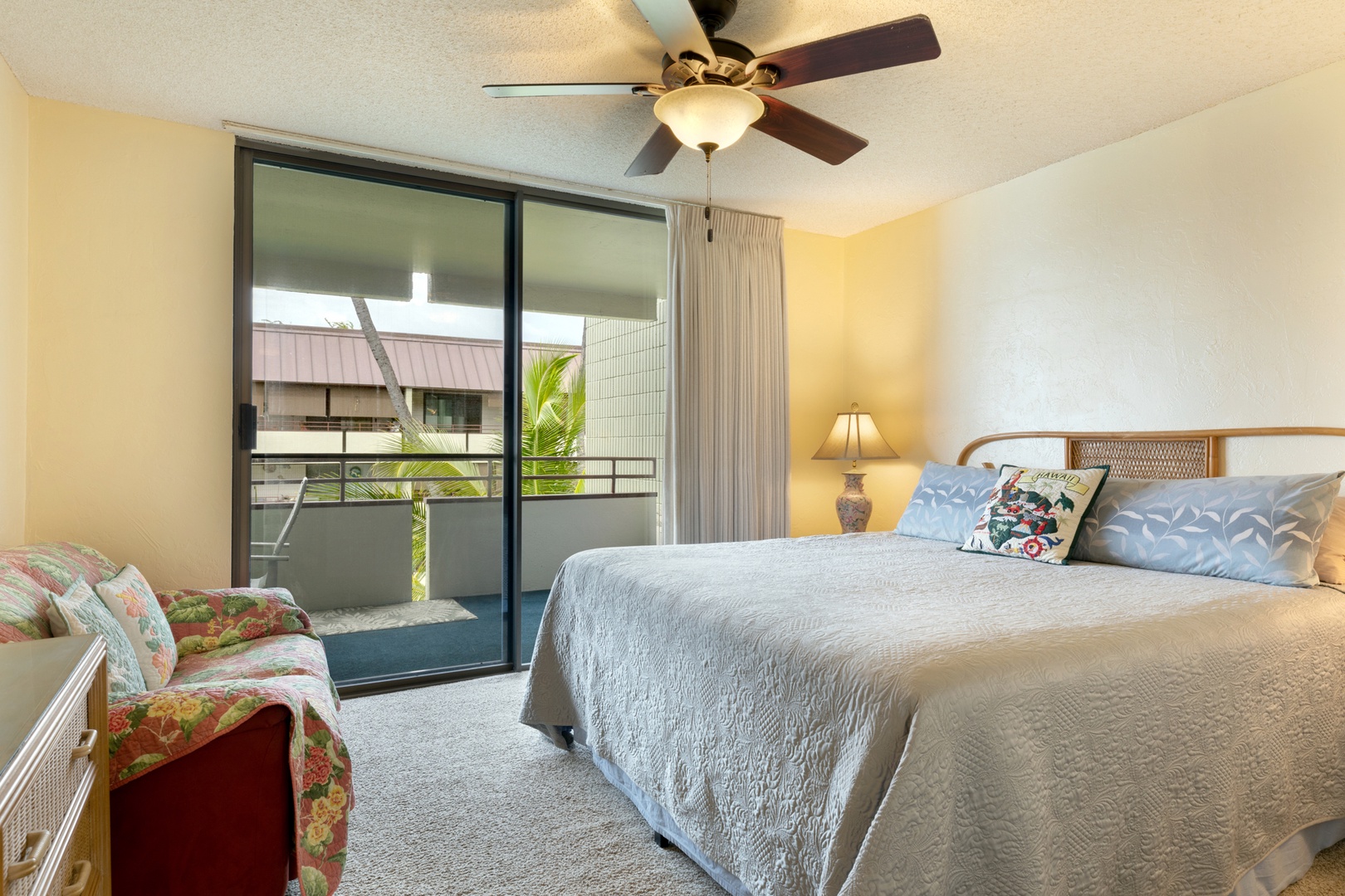 Primary Bedroom with King bed, lanai access, and ensuite