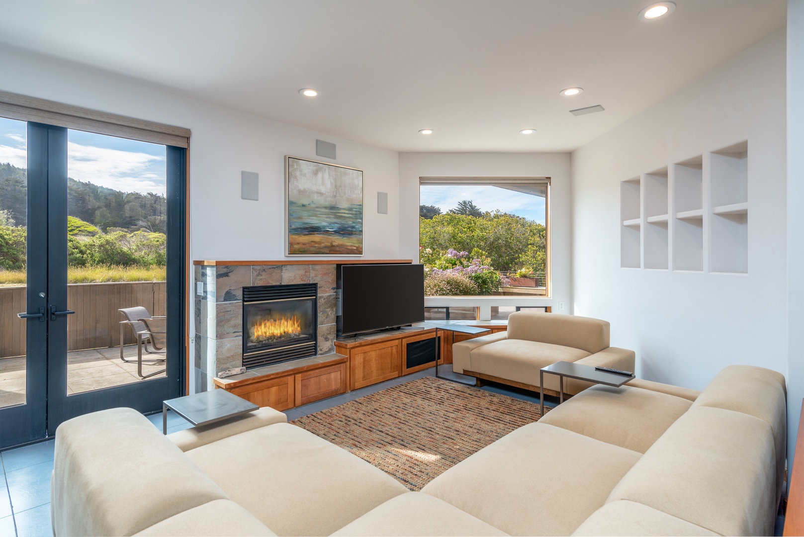 Living room features SmartTV and gas fireplace