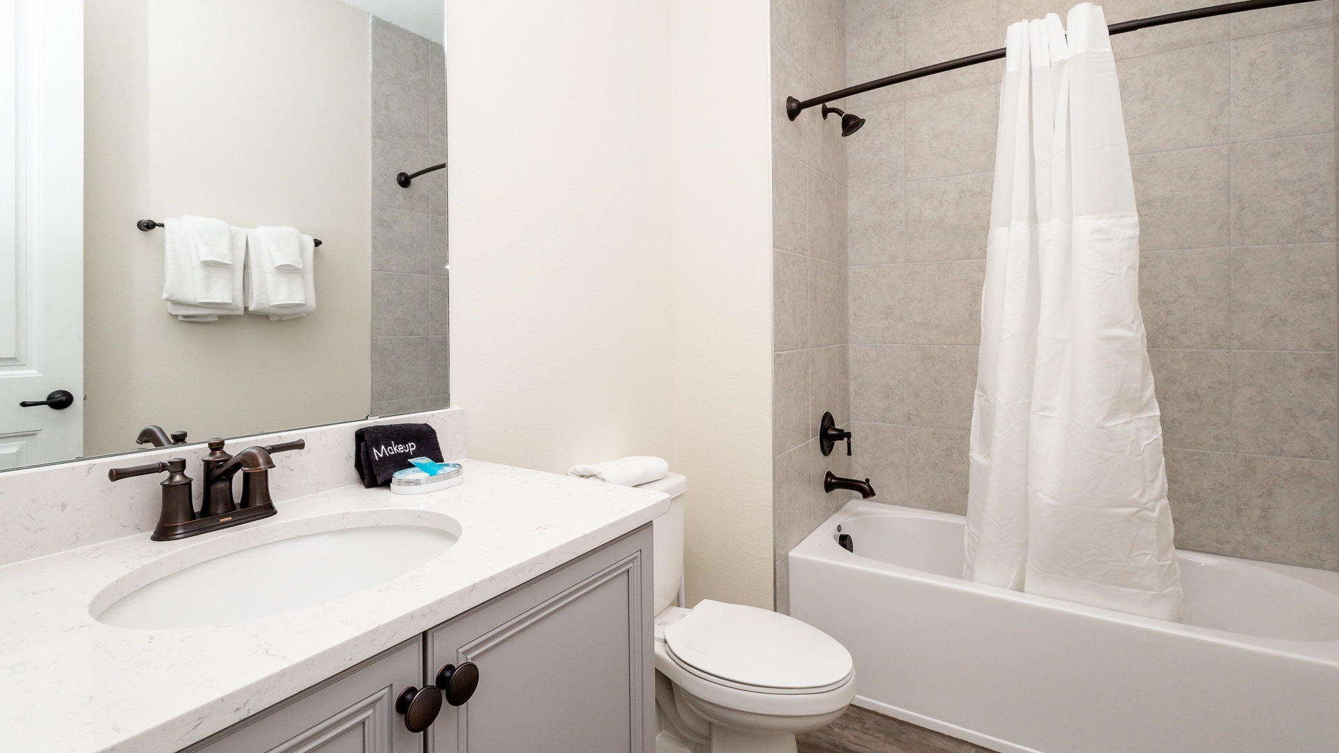 This 2nd floor full bathroom offers a single vanity & shower/tub combo