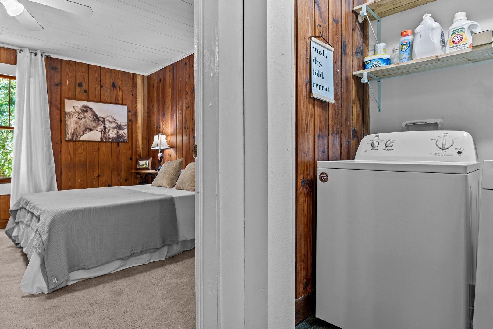 Private laundry is available for your stay, tucked away off the kitchen