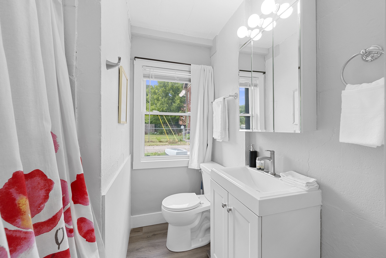 Get ready for the day in the full bath, with a single vanity & shower