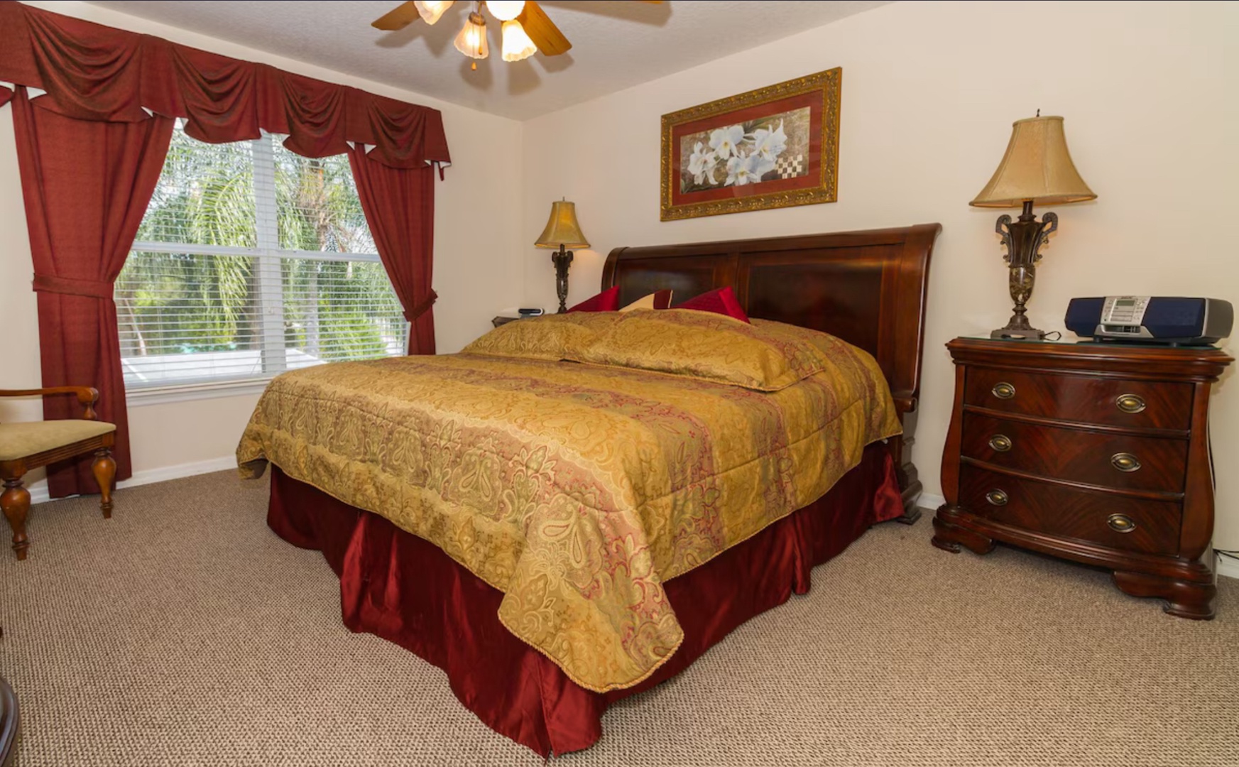 The king suite boasts a private ensuite, Smart TV, & ceiling fan