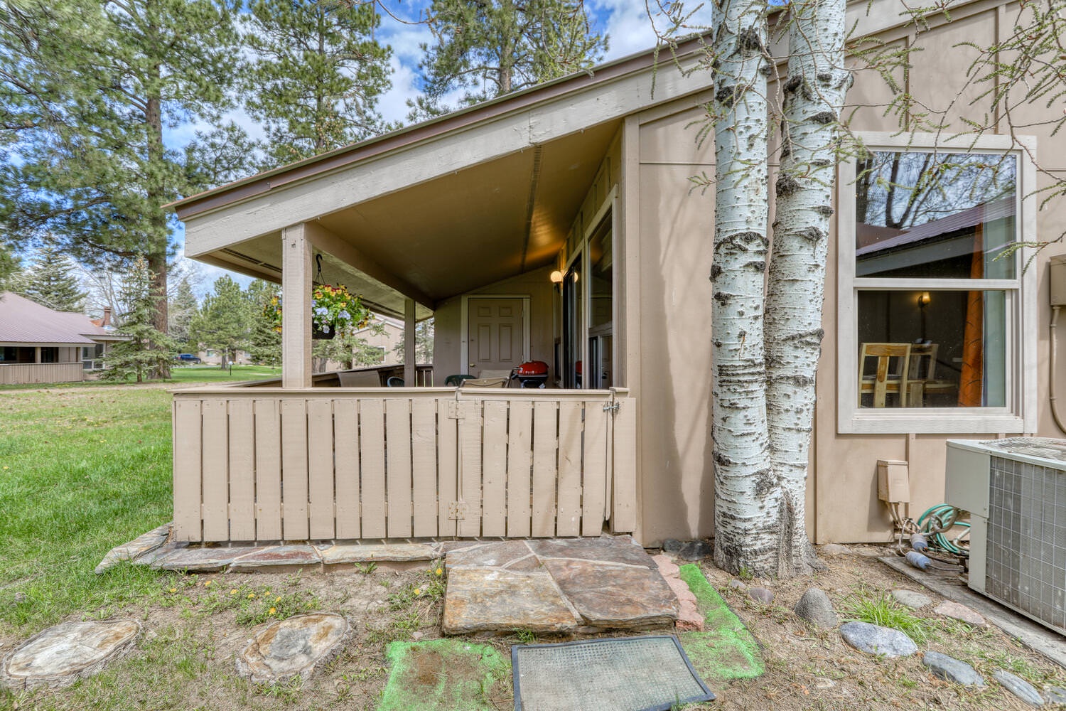 Covered patio gate from yard