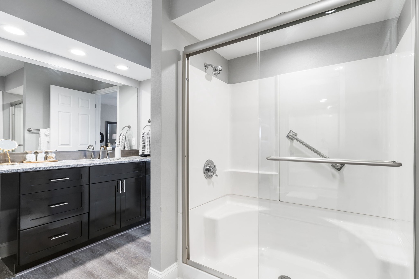 The second ensuite includes an oversized vanity & walk-in shower