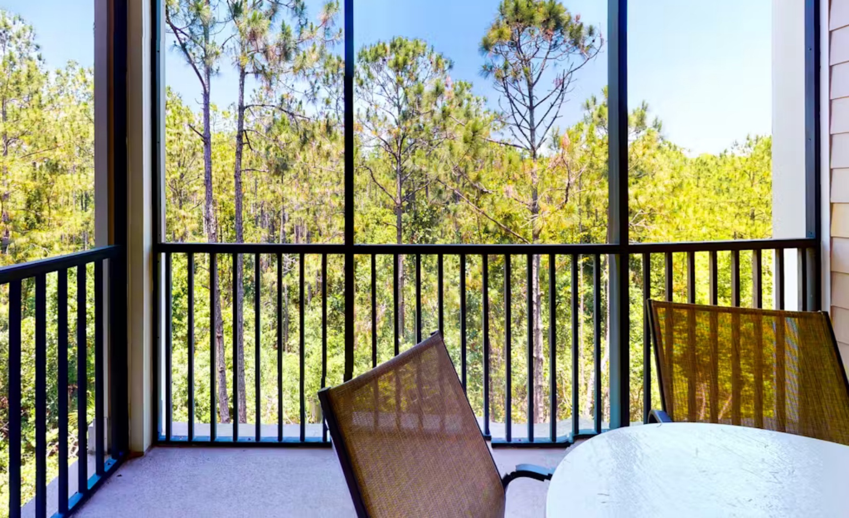 Enjoy morning coffee or dine alfresco on the breezy screened balcony