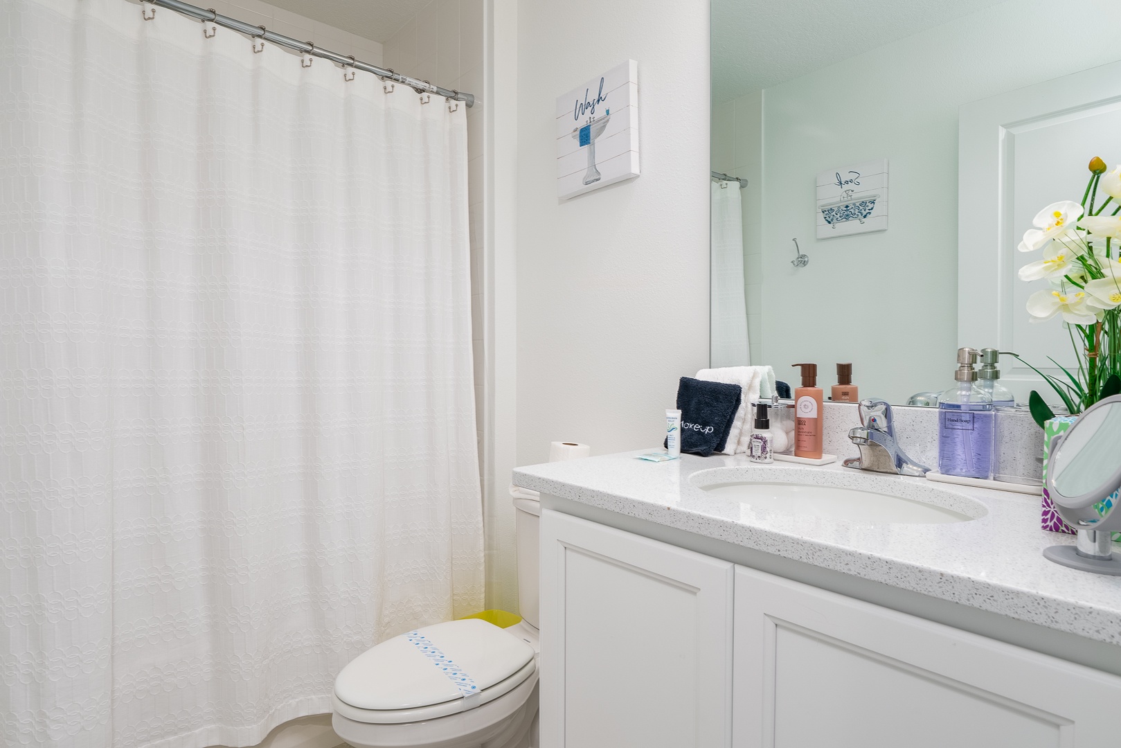 The shared second floor full bath offers a single vanity & shower/tub combo