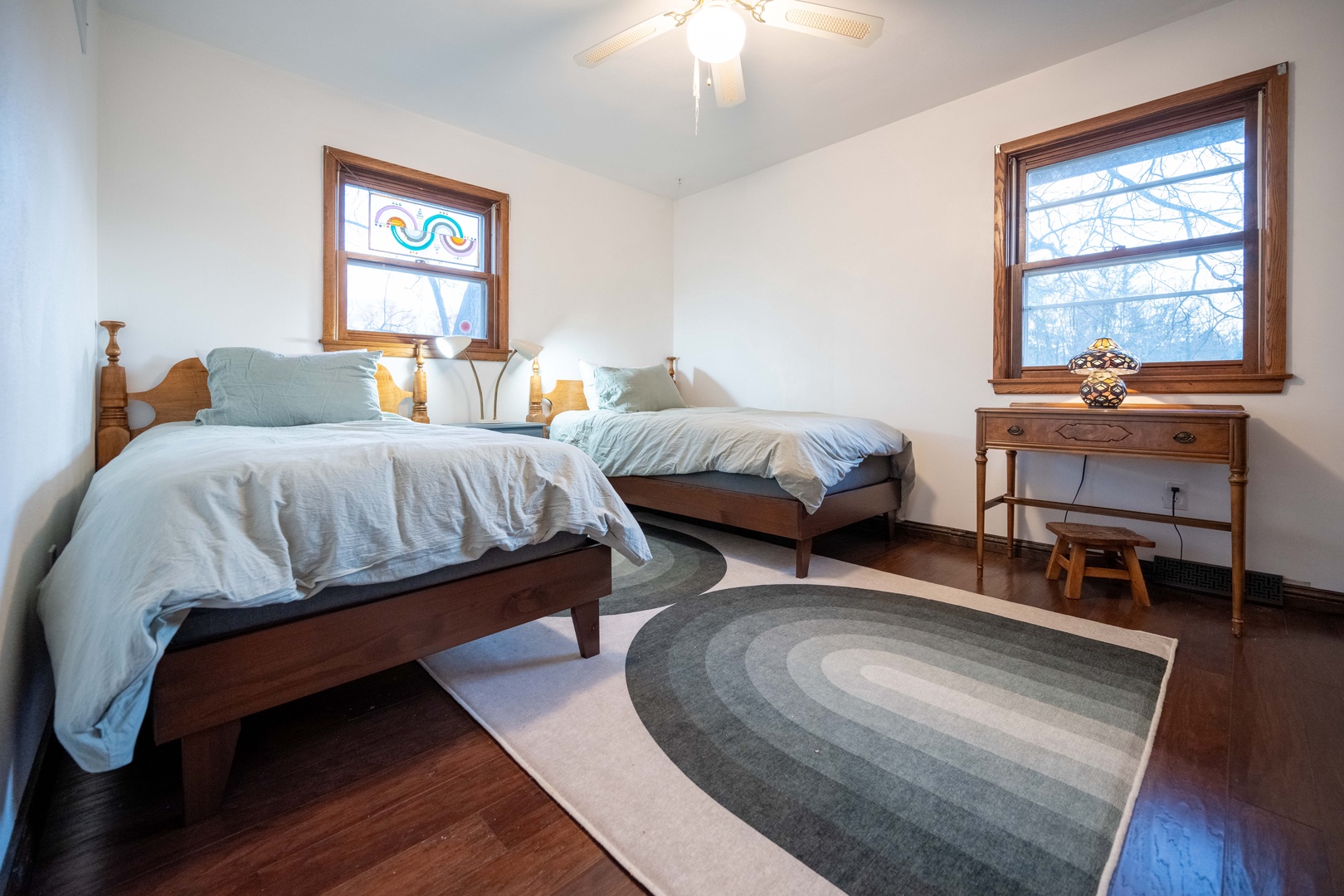 This 2nd floor bedroom offers a pair of cozy twin beds