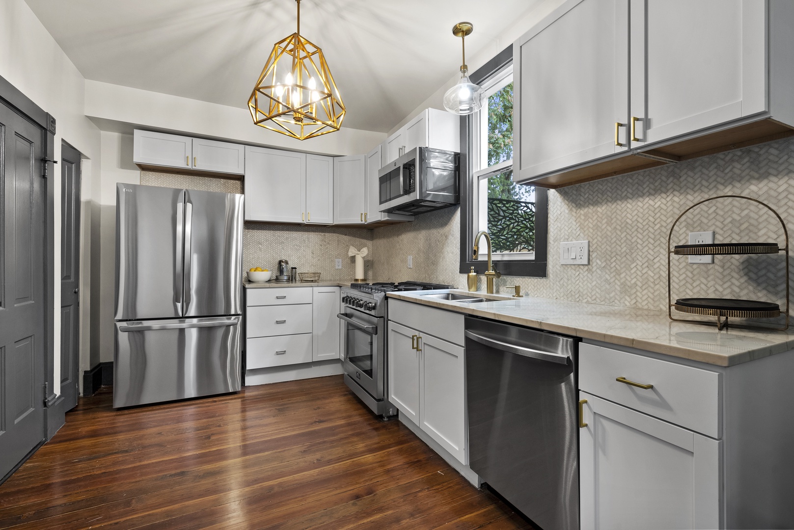 The updated kitchen offers ample space & every home comfort