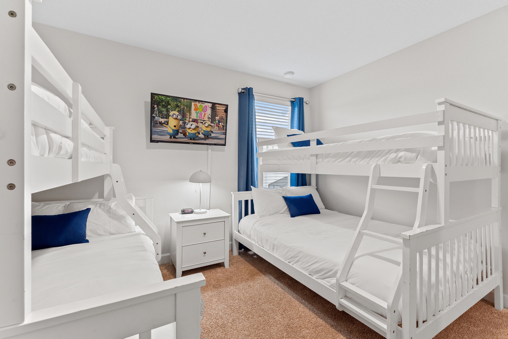 Bedroom 3 with 2 twin/full bunk beds and TV