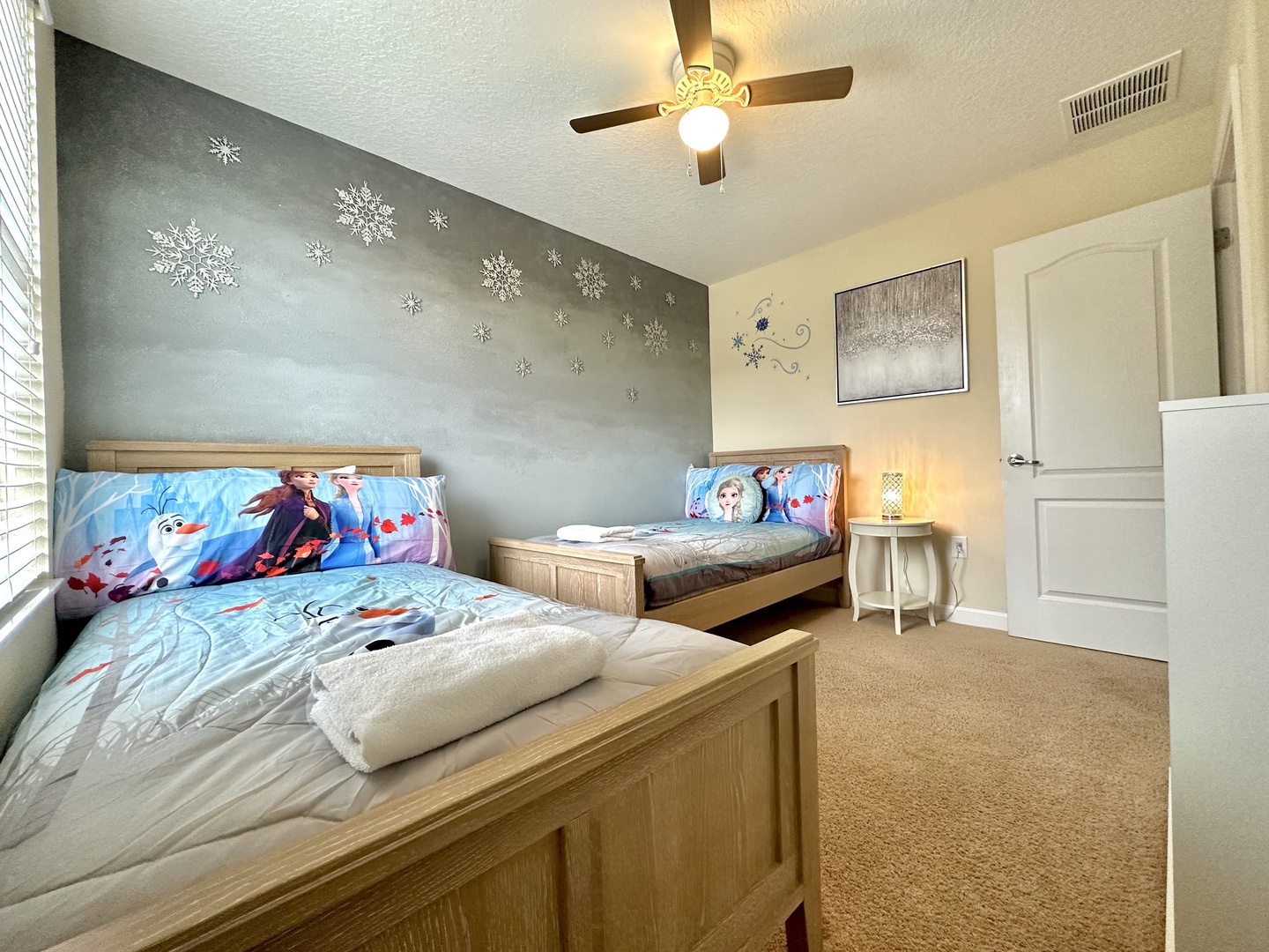 Frozen themed bedroom with 2 beds