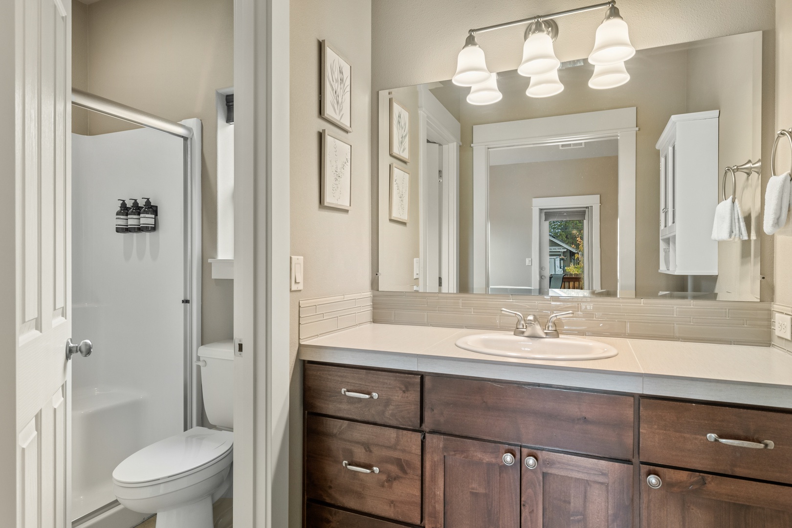 The master en suite includes an oversized single vanity & walk-in shower
