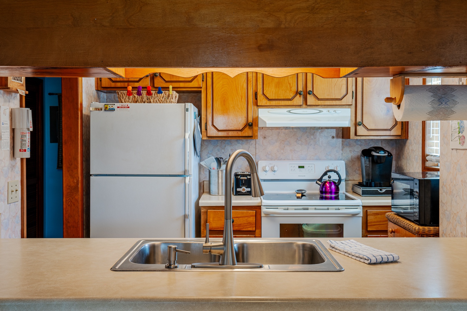 An open, airy kitchen equipped with all the comforts of home