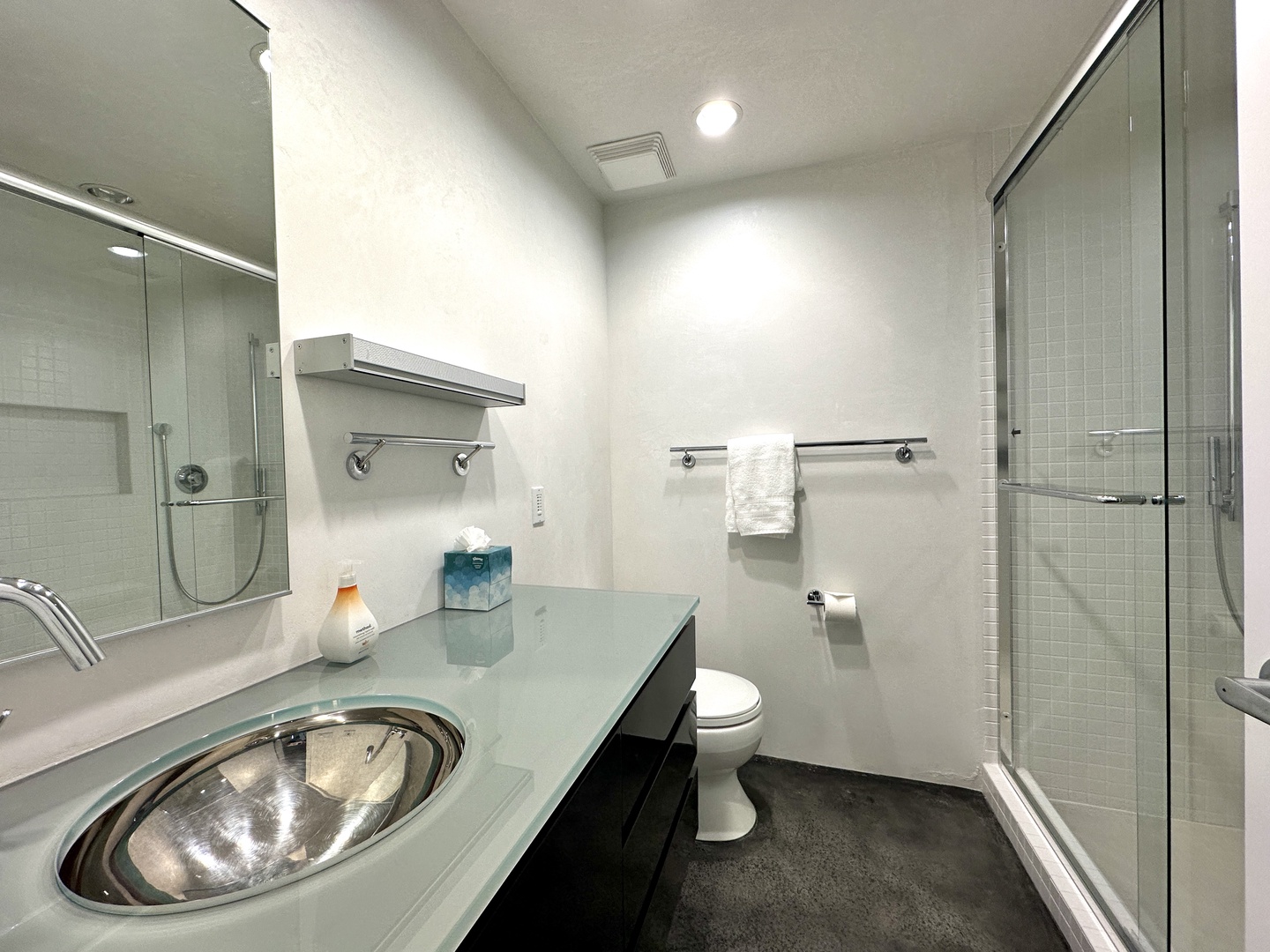 This 1st floor ensuite includes a large vanity & glass shower