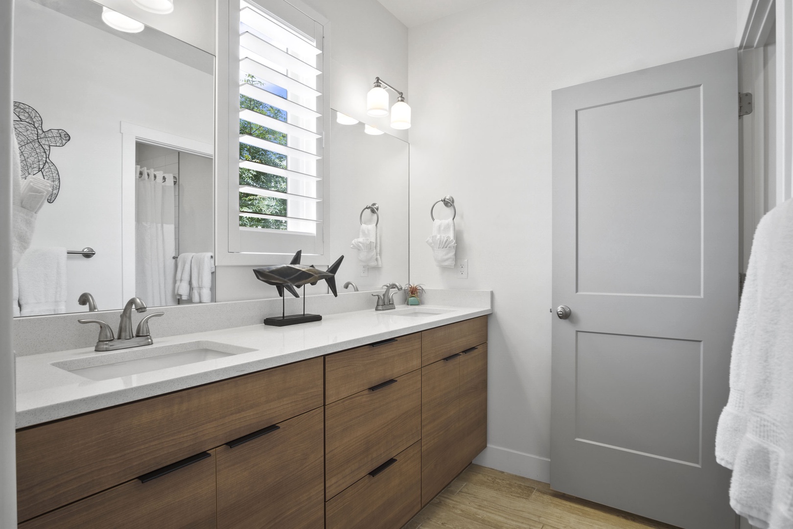 The Bunk Room’s En Suite offers a sprawling Double Vanity and Shower/Tub Combo