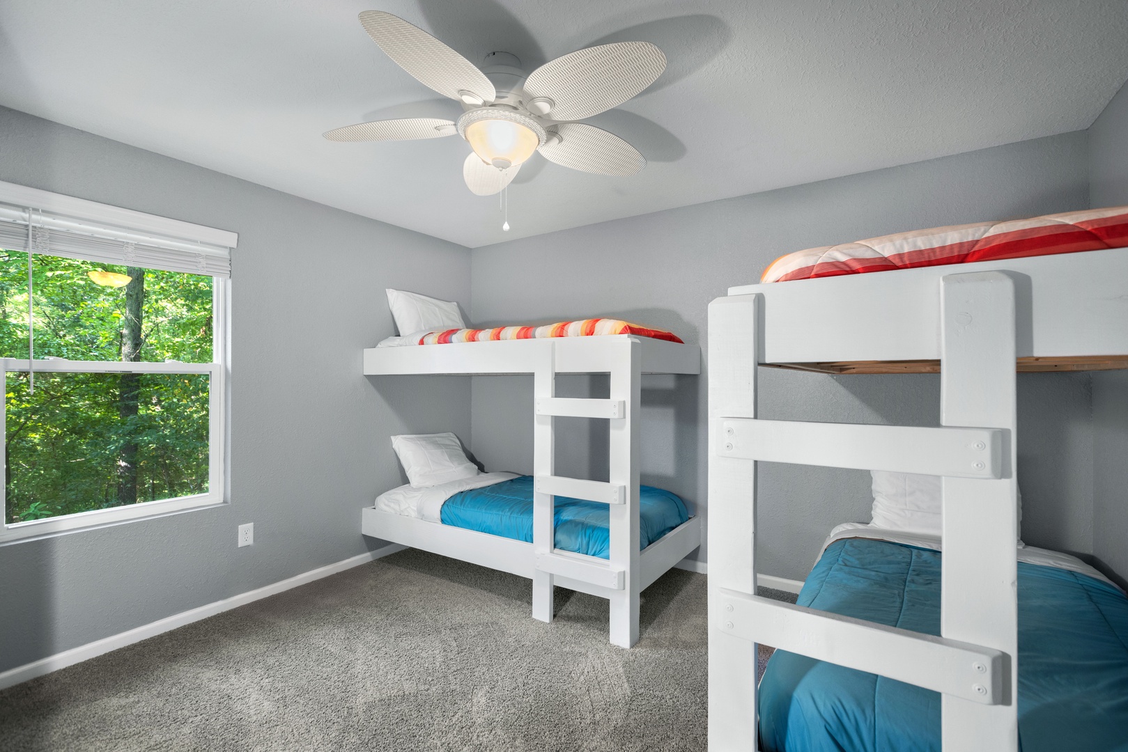 A pair of built-in twin bunkbeds is available in the guest house's third bedroom