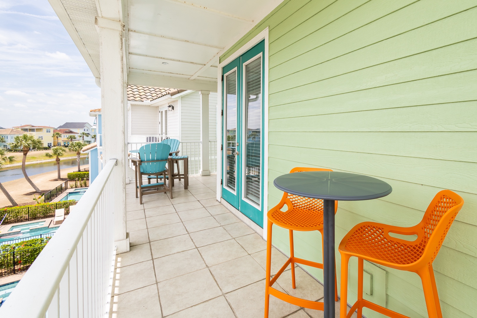 Balcony views from the 3rd floor king suite featuring 2 sitting areas sitting 2 each