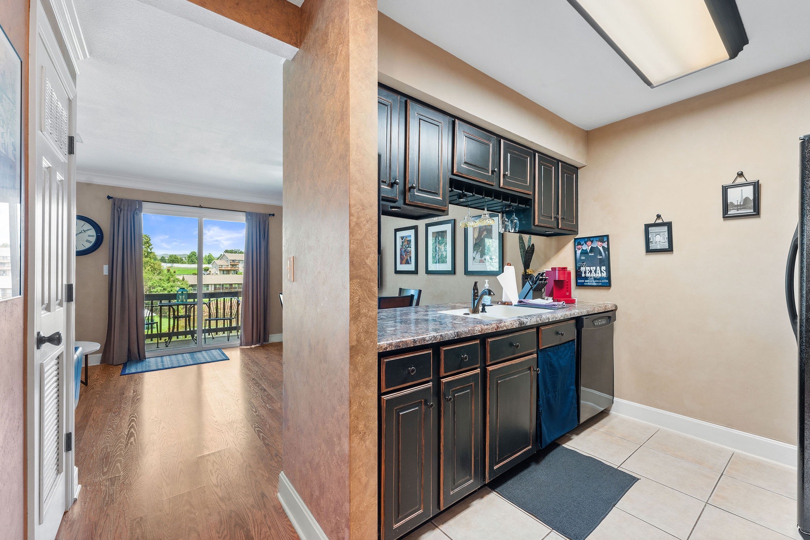 The open, airy kitchen offers ample space & every home comfort