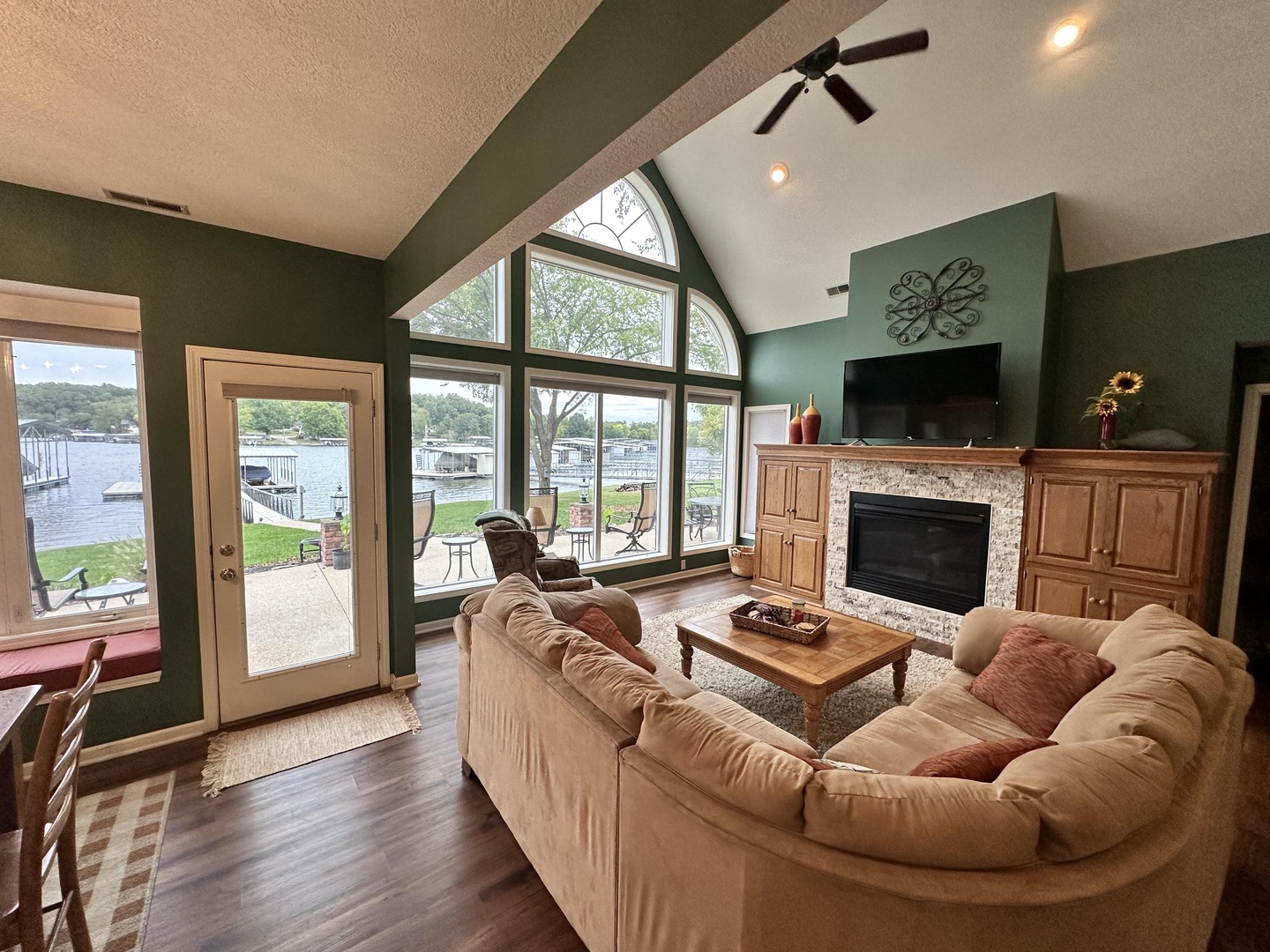 Bright living space with sectional sofa, and Smart TV