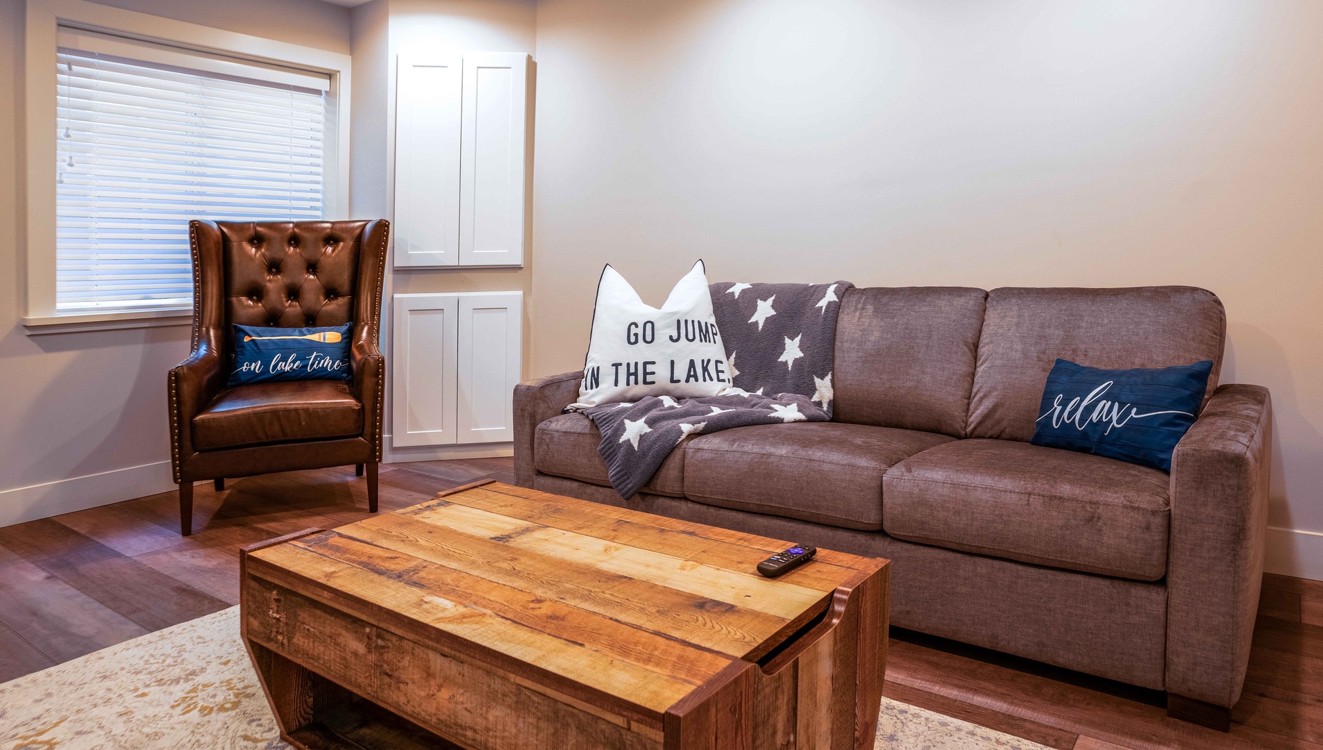 The lower-level den is ideal for relaxation & gaming!