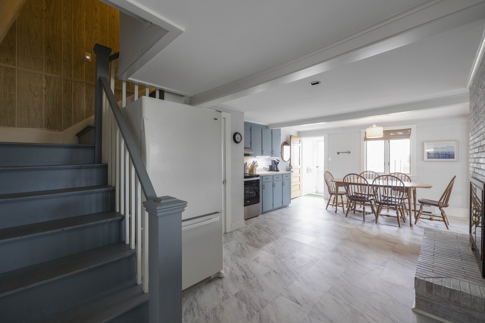 The open, airy kitchen offers ample space & all the comforts of home