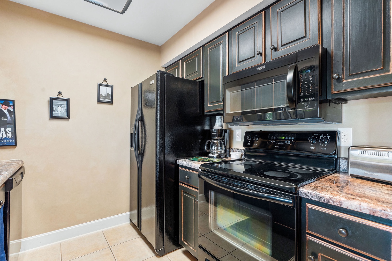 The open, airy kitchen offers ample space & every home comfort