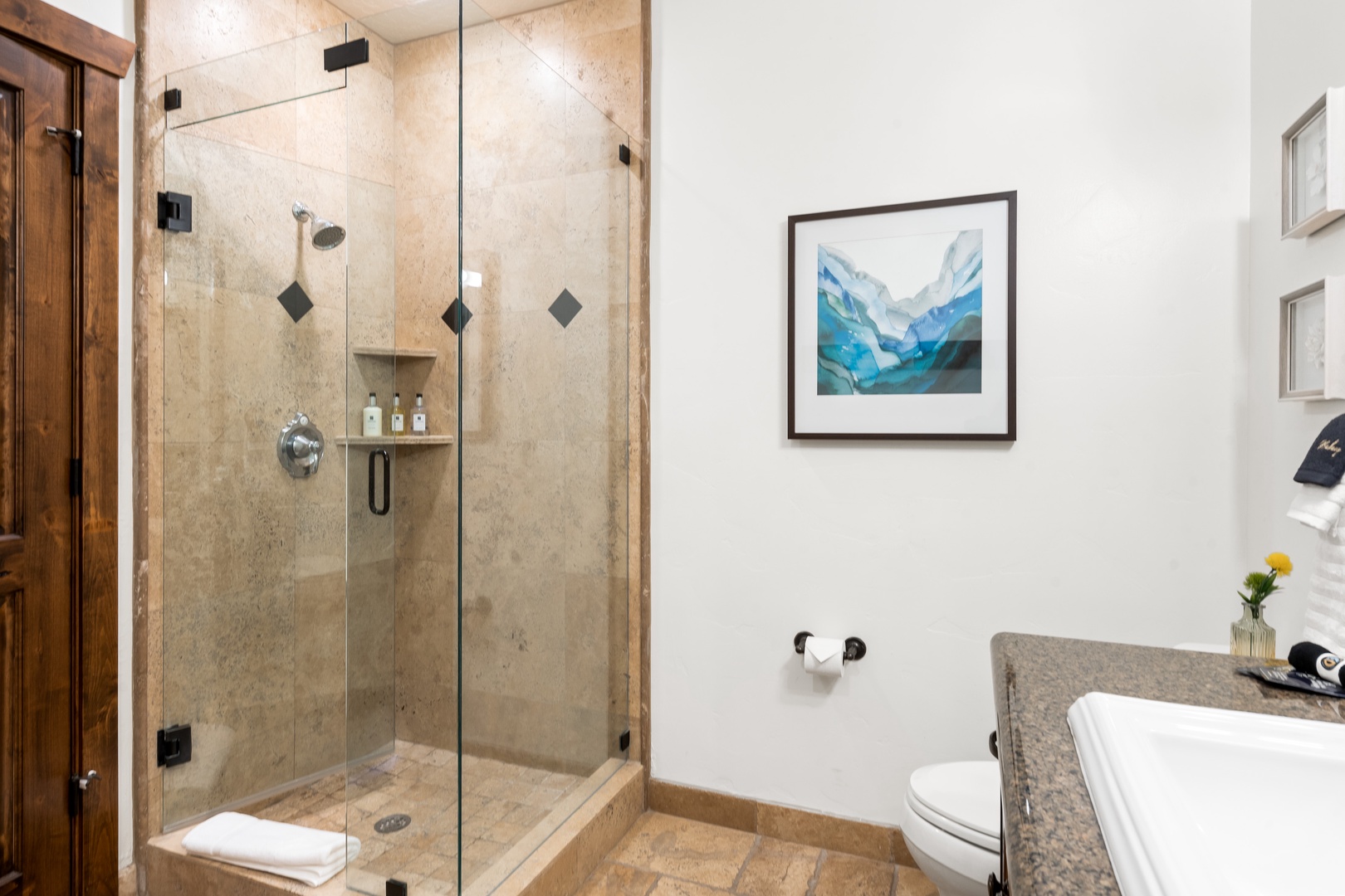 Calming Queens Bathroom w/ Walk-In Shower and Large Tub