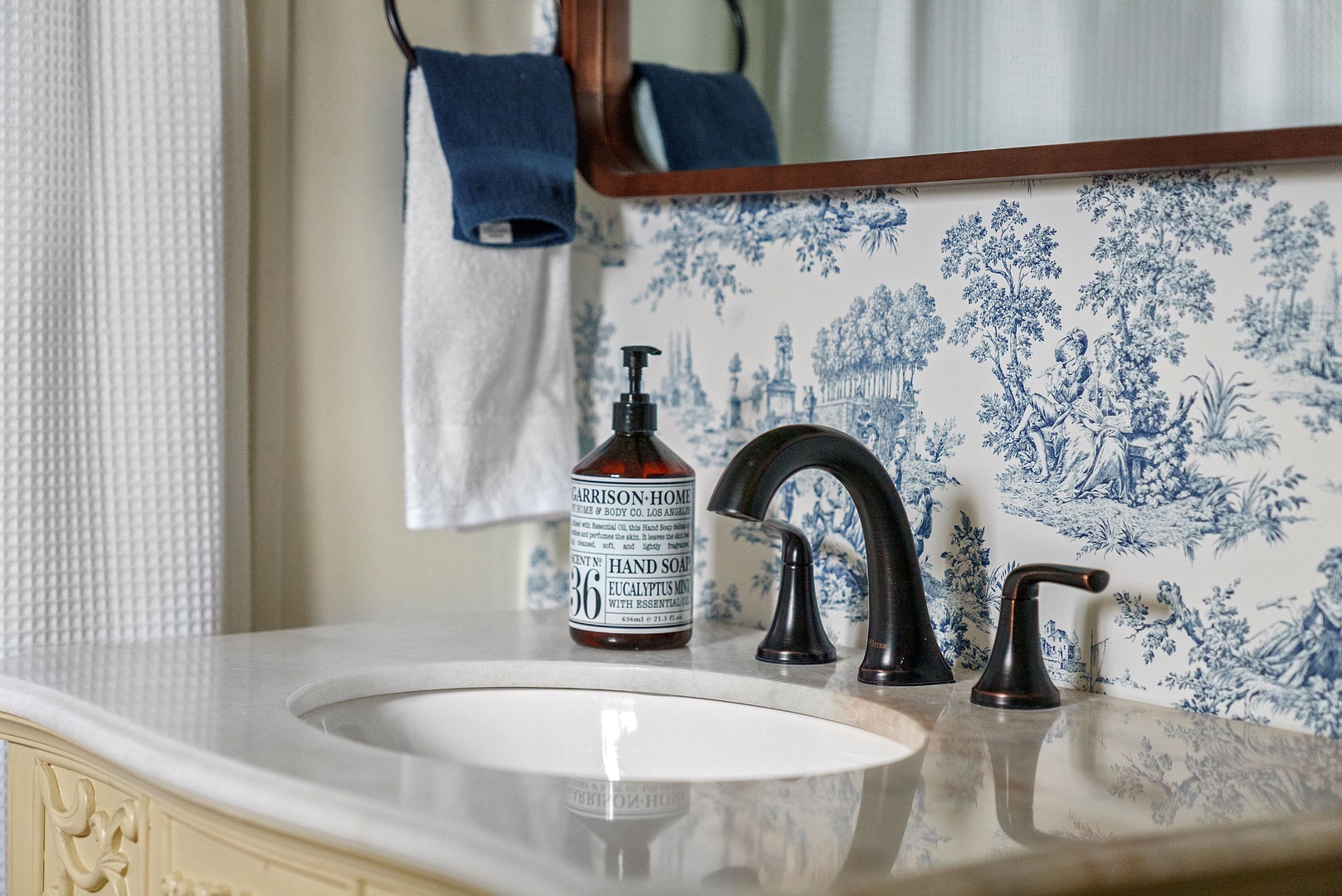 The 1st floor full bath offers a stylish single vanity & shower/tub combo