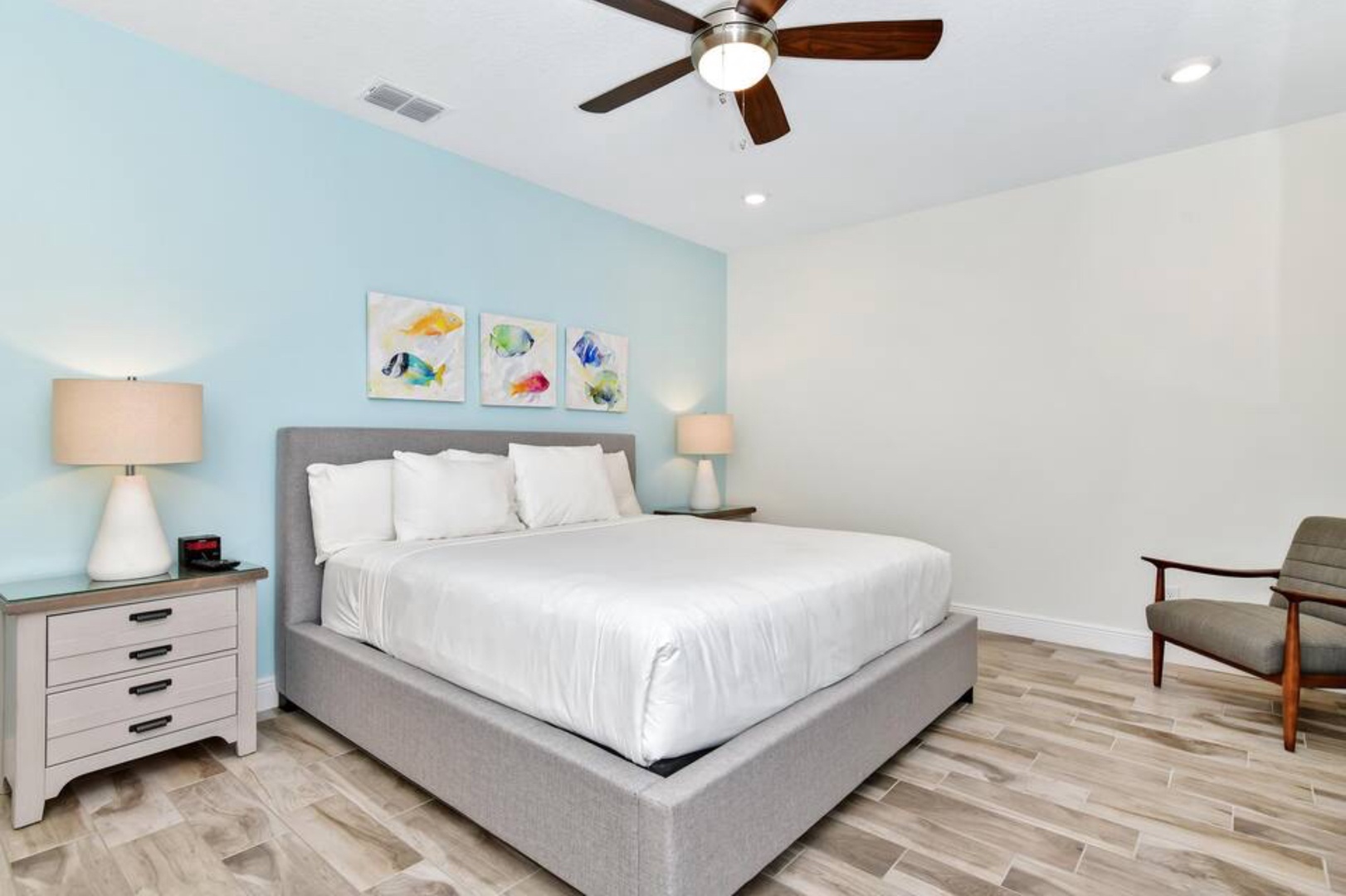 This cozy 2nd Fl bedroom with King bed, smart TV, and ceiling fan