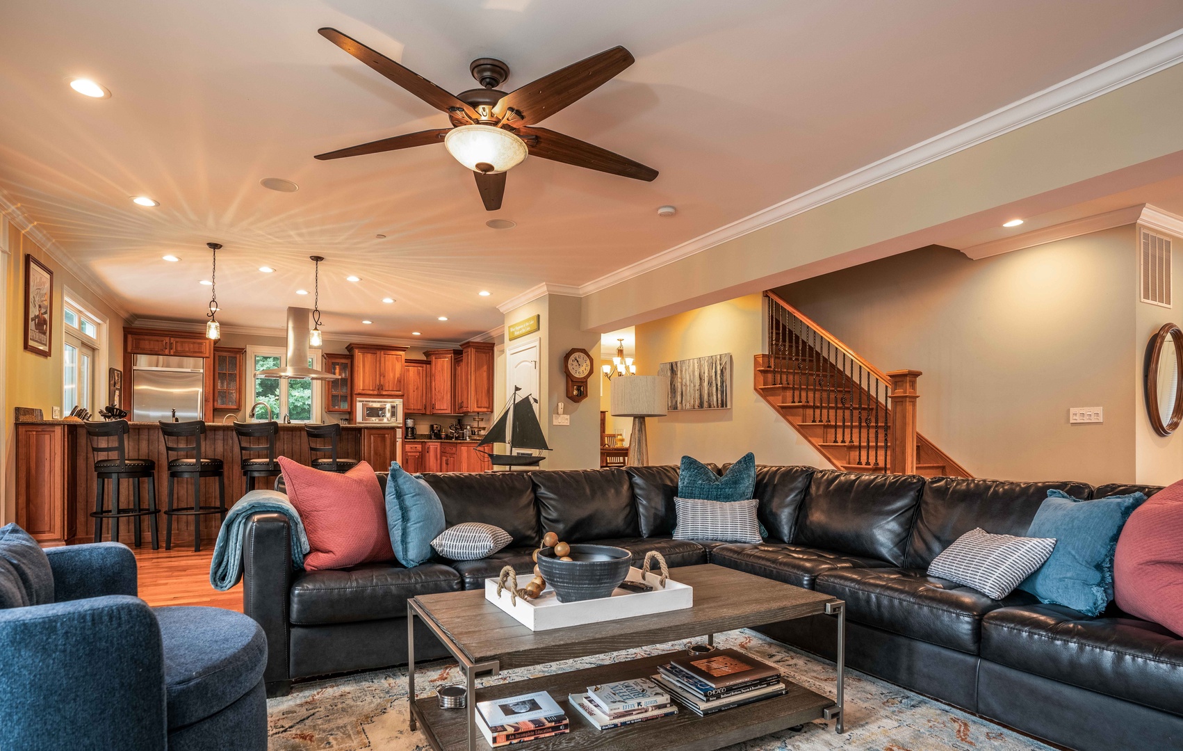 Open living area with section seating, and Smart TV