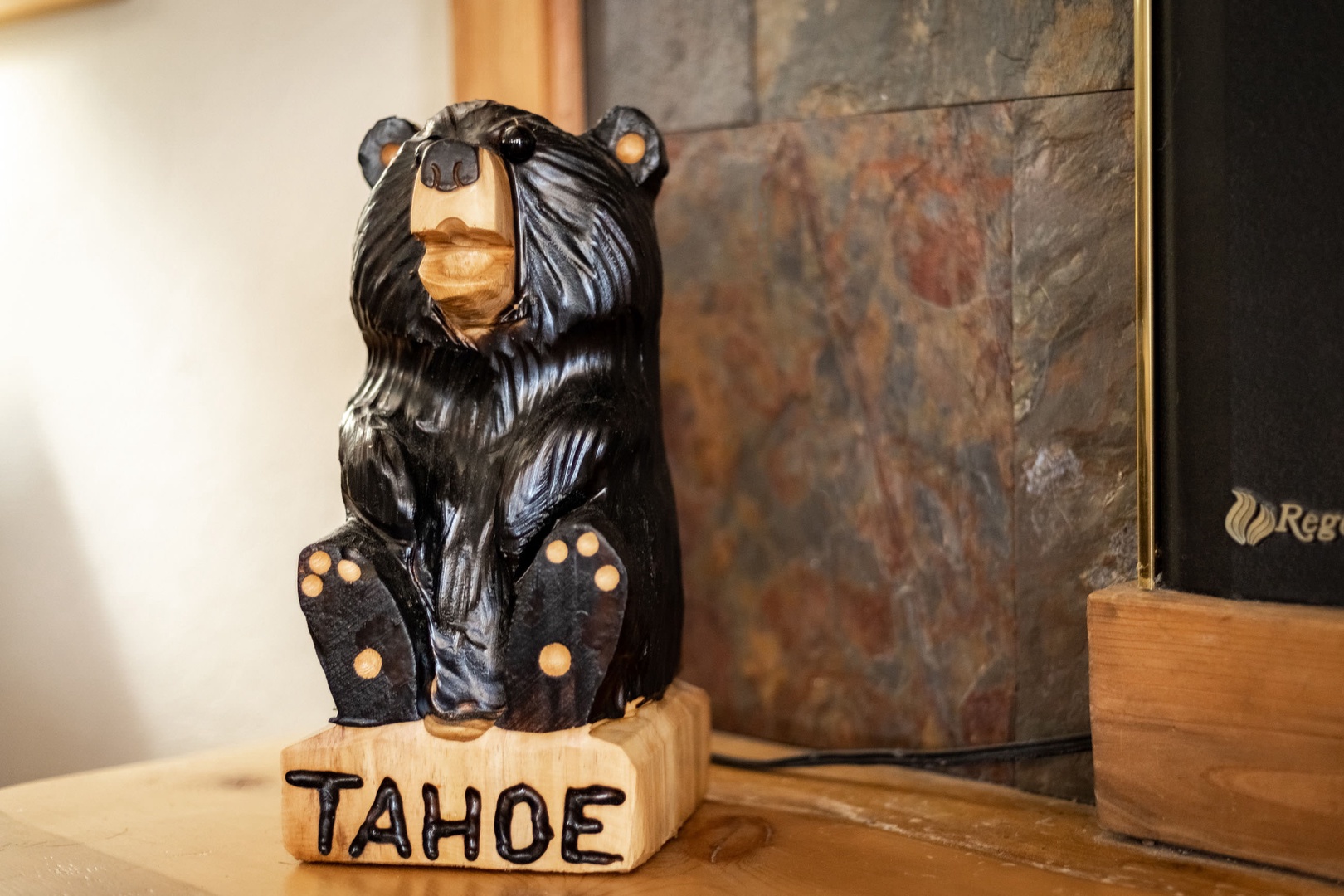 Tahoe bear decor by fireplace