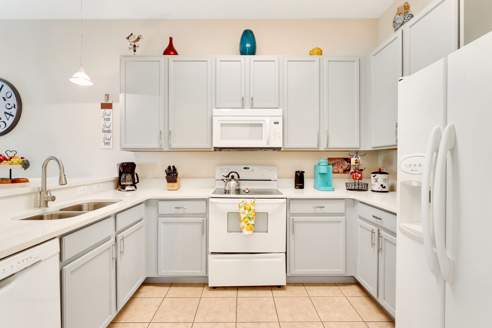 The open, airy kitchen offers ample space & all the comforts of home