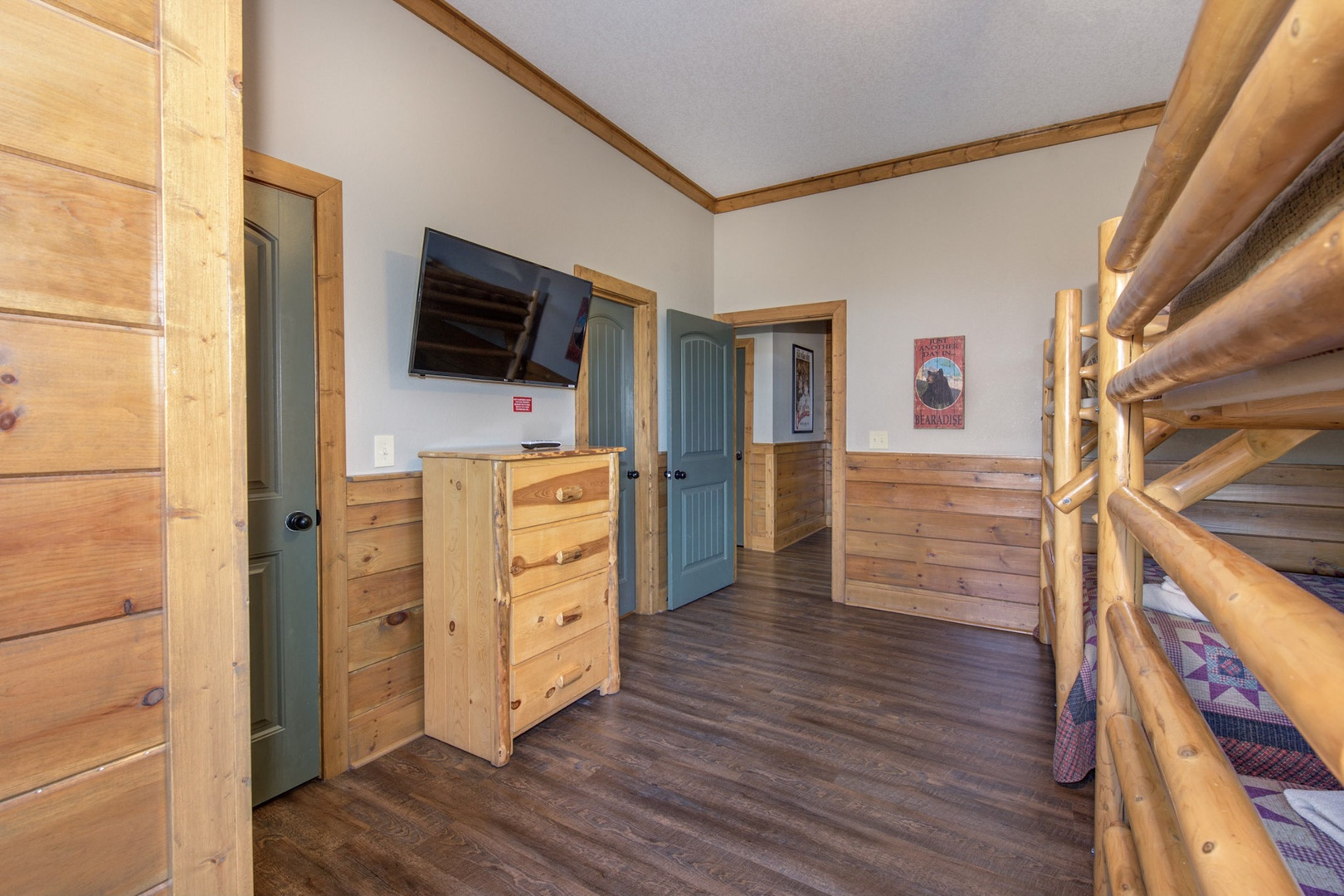 The final 1st-floor suite offers 2 full-over-full bunks, ensuite, patio, & TV