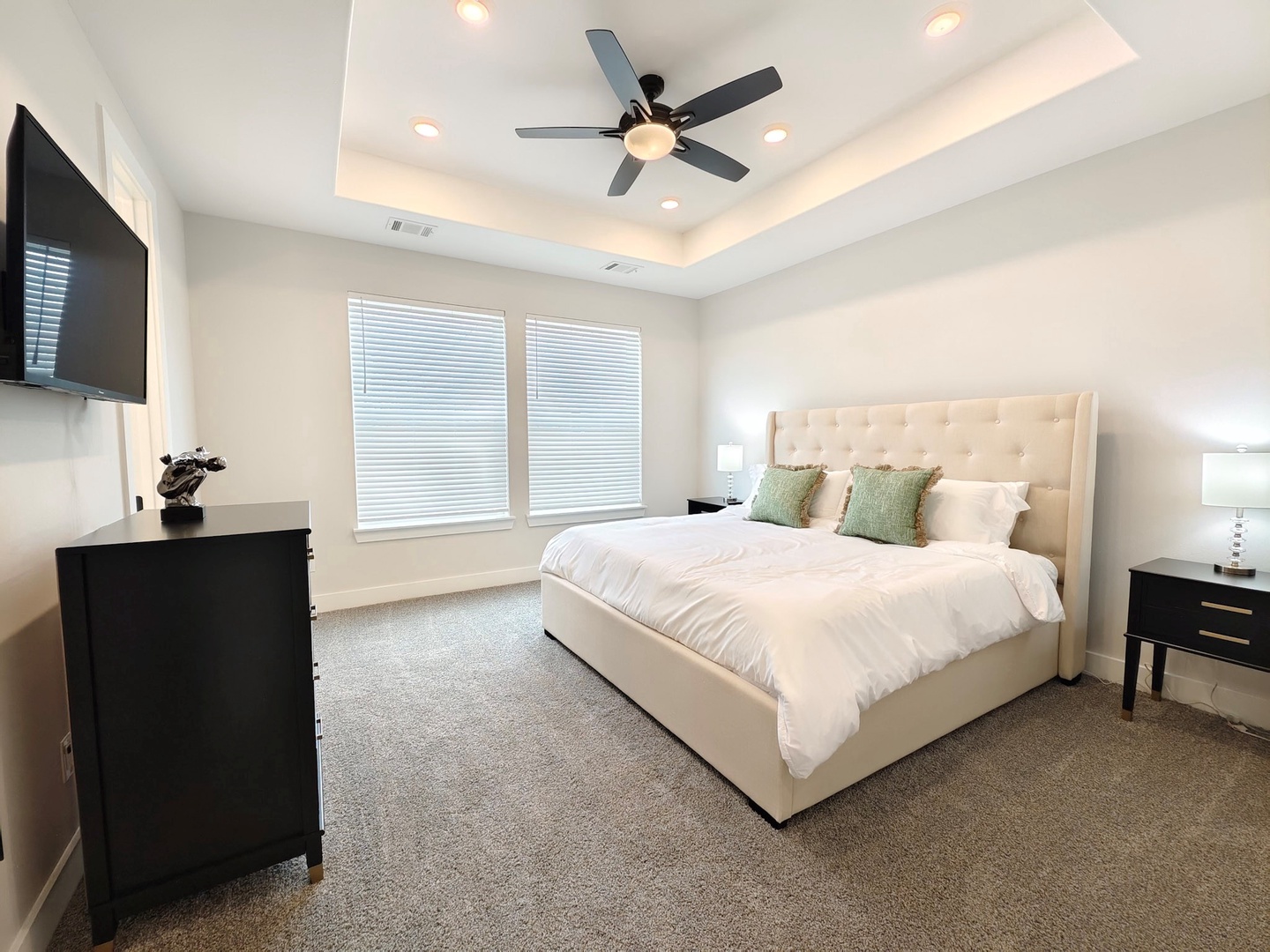 The 3rd-floor king suite boasts a grand ensuite, large closet, & Smart TV