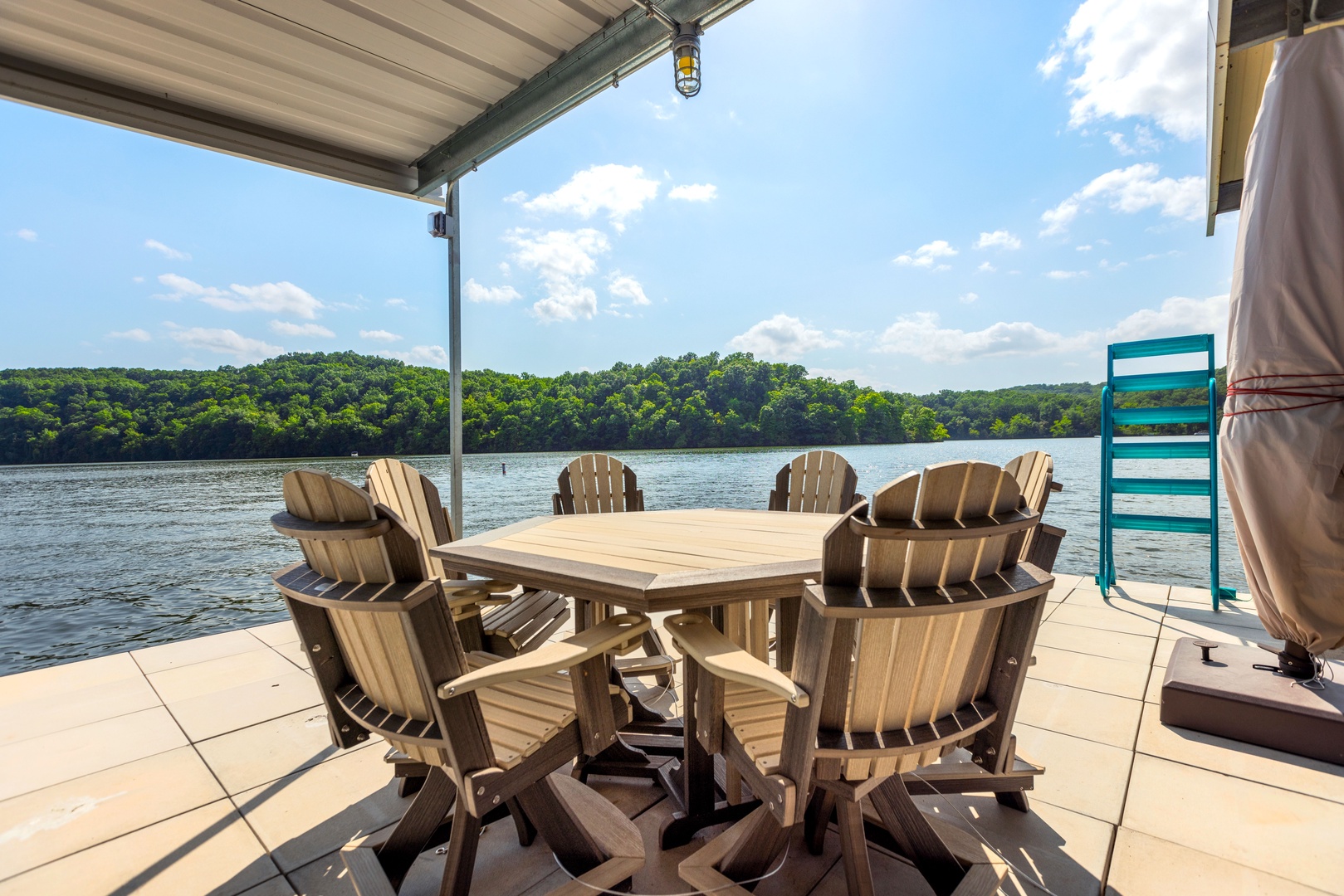 Relax on the dock in a quiet cove, complete with a table and stunning views!