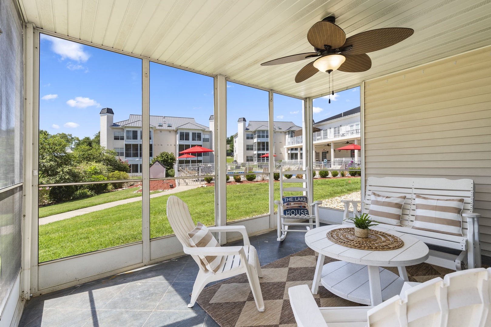 Enjoy dining & lounging with a view on the screened-in patio