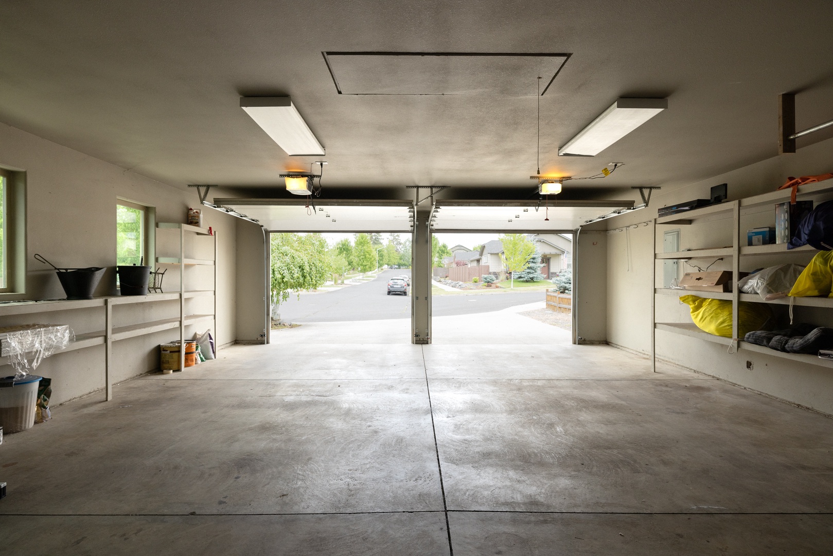 The garage offers parking space for up to 2 vehicles