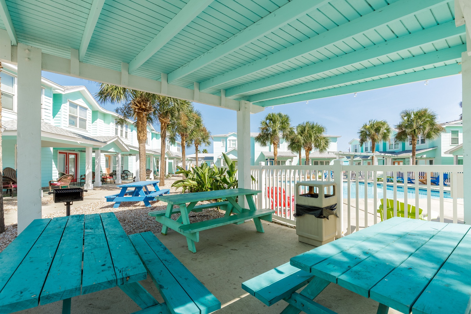 Lounge & dine in the fresh air in the poolside communal BBQ area