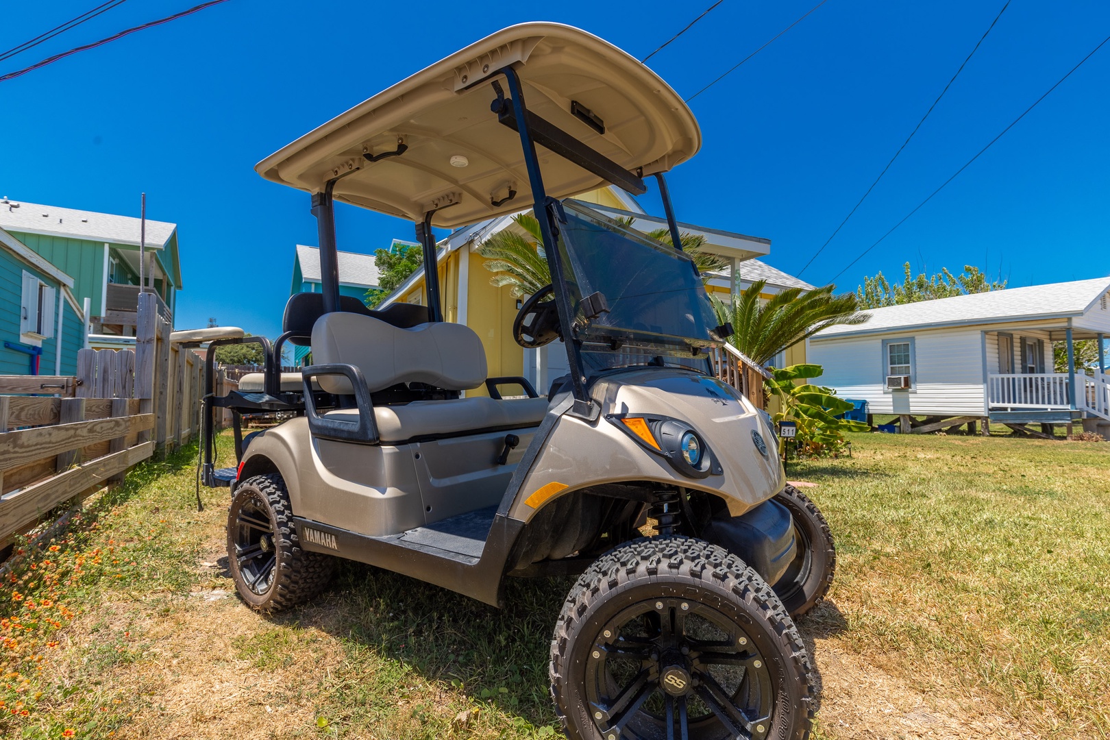 Take a cruise down to the beach on the included golf cart