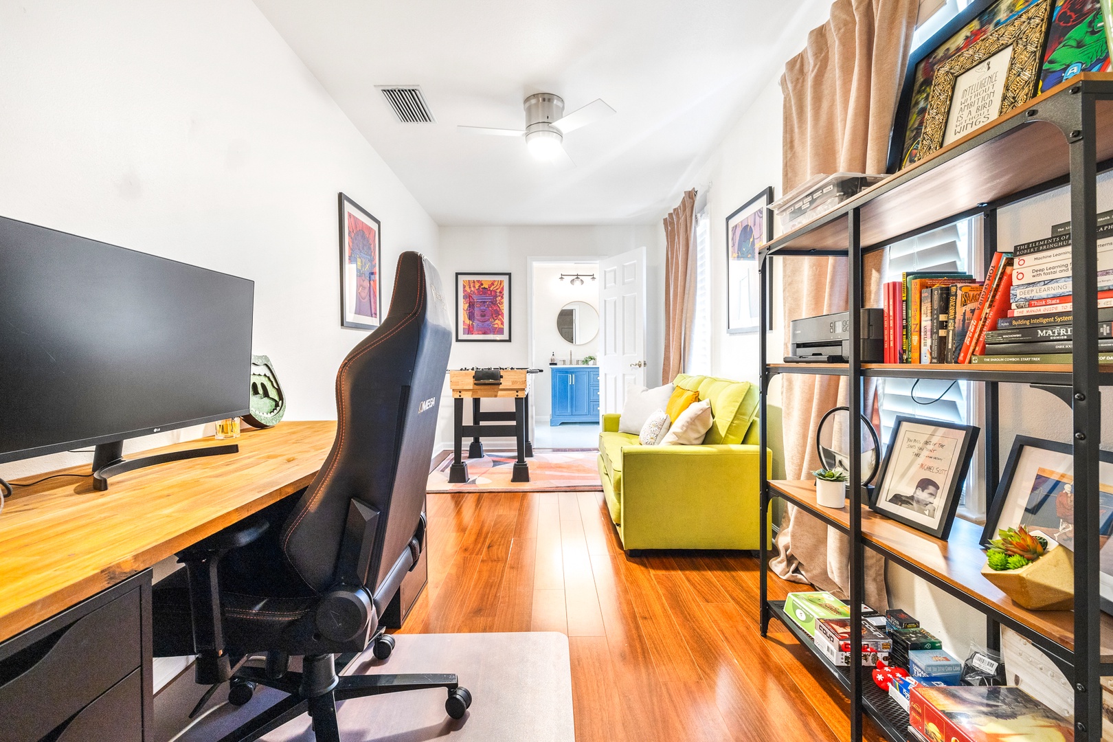 Game room with sofa sleeper, foosball, and shared ensuite